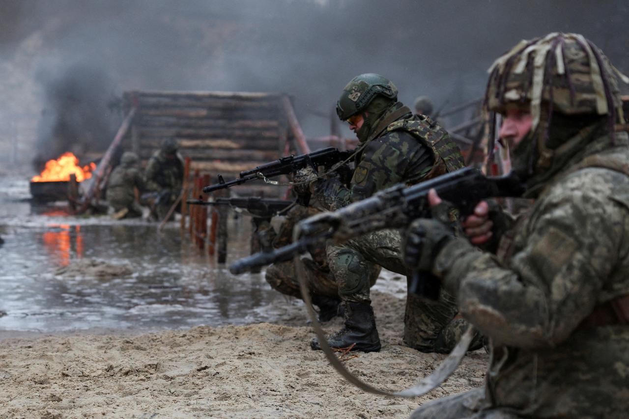 Ukrainian soldiers take part in a military drill on psychological combat training