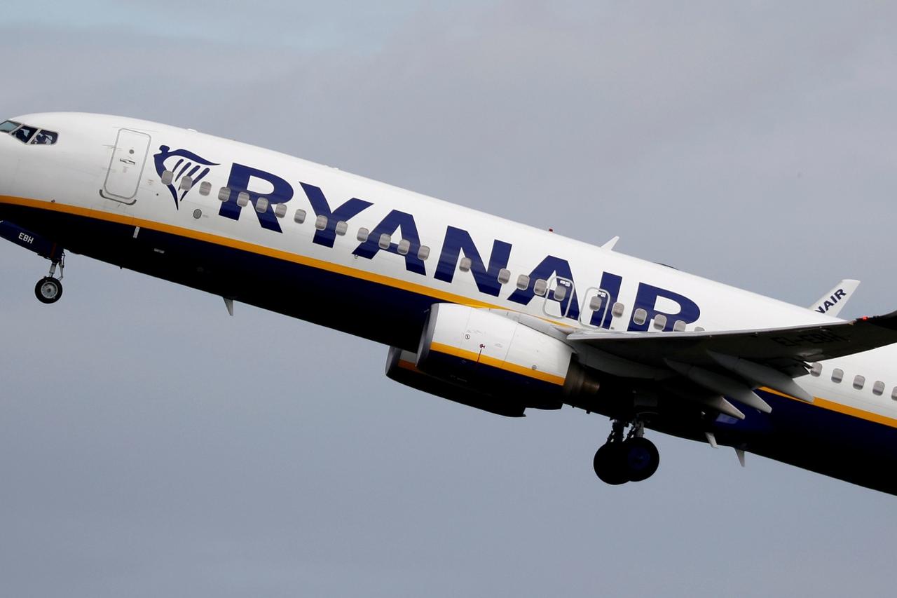 FILE PHOTO: A Ryanair plane takes off from Manchester Airport as the spread of the coronavirus disease (COVID-19) continues in Manchester