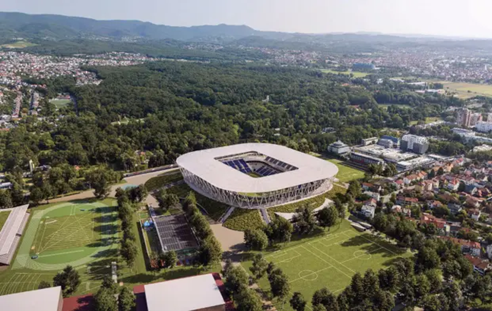 Stadion je uzdignut unutar parka, pri čemu su teren i donji prsten gledališta ukopani u oblikovani teren, dok se iznad njih uzdiže lagana transparentna konstrukcija gornjih tribina i krova. Baza stadiona oblikovana je kao kontinuirana topografija. U anketnoj zoni sportski su sadržaji smješteni uz rubove, čime se oslobađa središnja pješačka os koja povezuje Maksimirsku ulicu, sportske dvorane, atletske sadržaje i javni trg iznad terminala Borongaj.