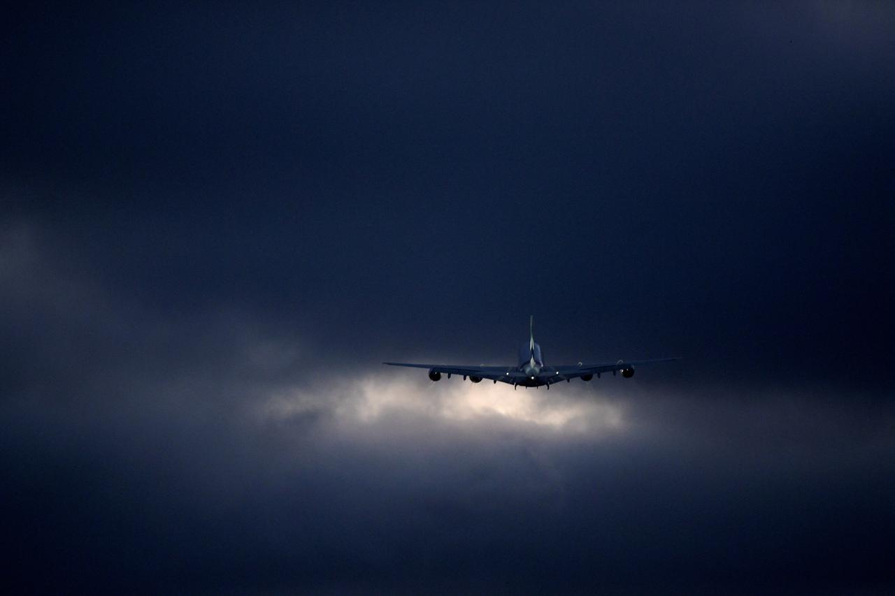 FILE PHOTO: An Airbus A380 takes off after Airbus makes its last ever delivery of an A380 to Emirates in Hamburg-Finkenwerder