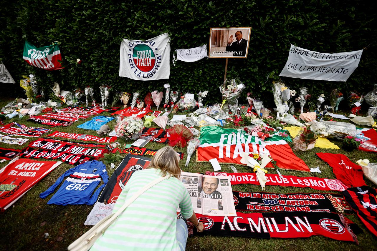People pay their respects ahead of former Italian PM Berlusconi's funeral, in Arcore