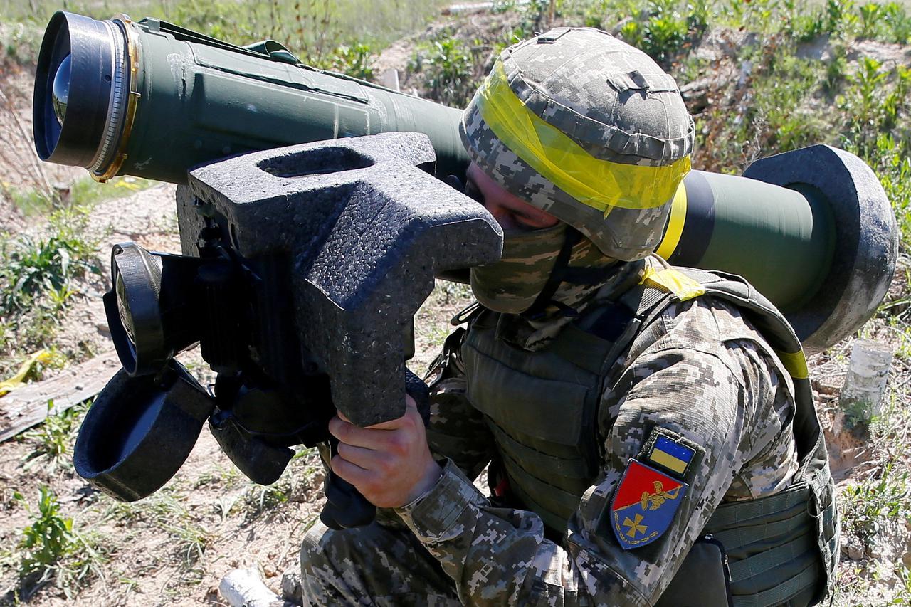A soldier holds a Javelin missile system during a military exercise in the training centre of Ukrainian Ground Forces near Rivne, Ukraine