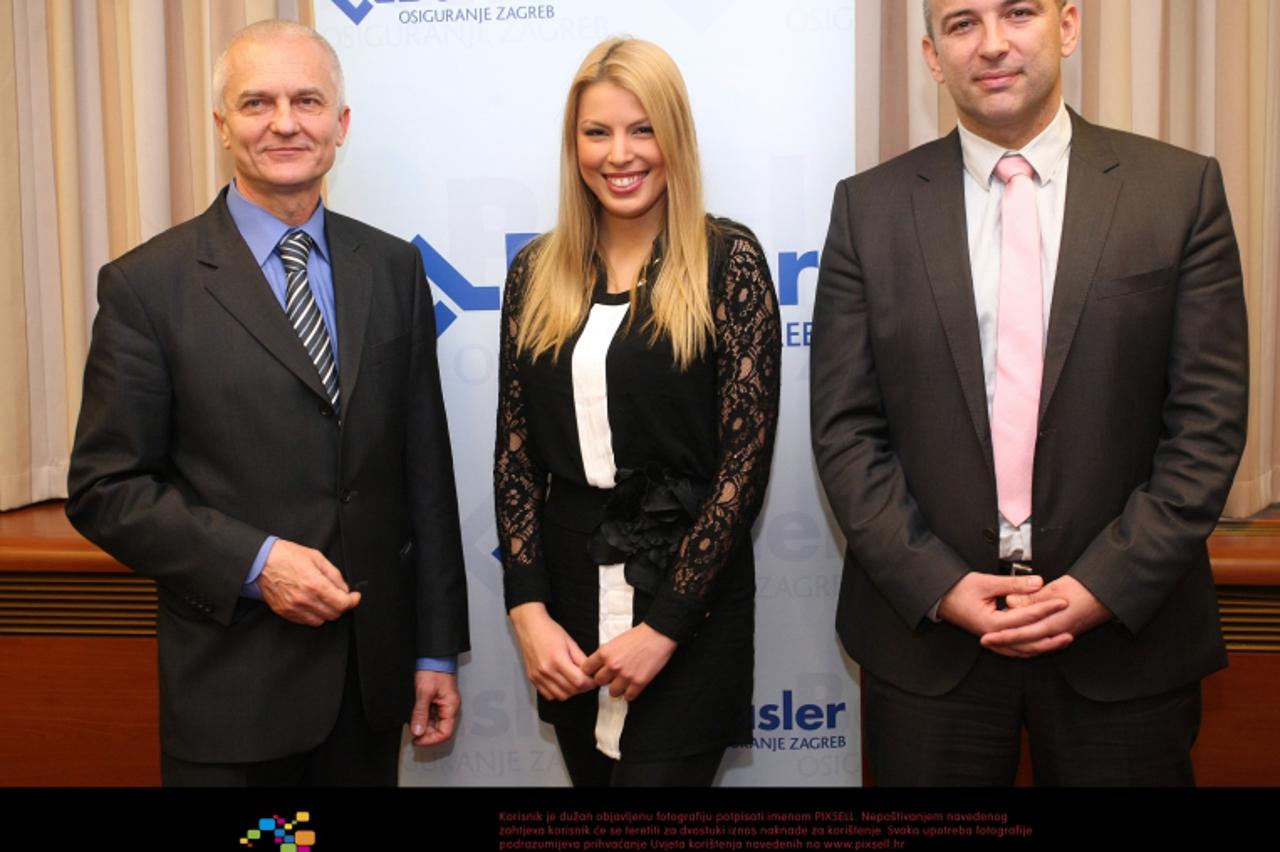 '28.12.2012., Zagreb - Hrvatski stolnoteniski savez i Basler osiguranje sklopili ugovor o sponzorstvu. Darko Cesar; Tina Katanic; Bozidar Bauk.  Photo: Petar Glebov/PIXSELL '