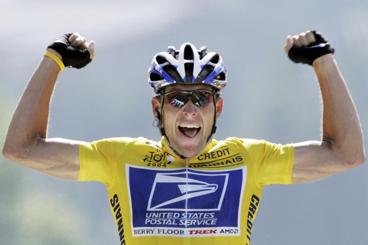 'U.S. Postal Service Team rider Lance Armstrong crosses the finish line to win the 204.5 km long 17th stage of the Tour de France from Bourd-d\'Oisans to Le Grand Bornand, France, in this July 22, 200