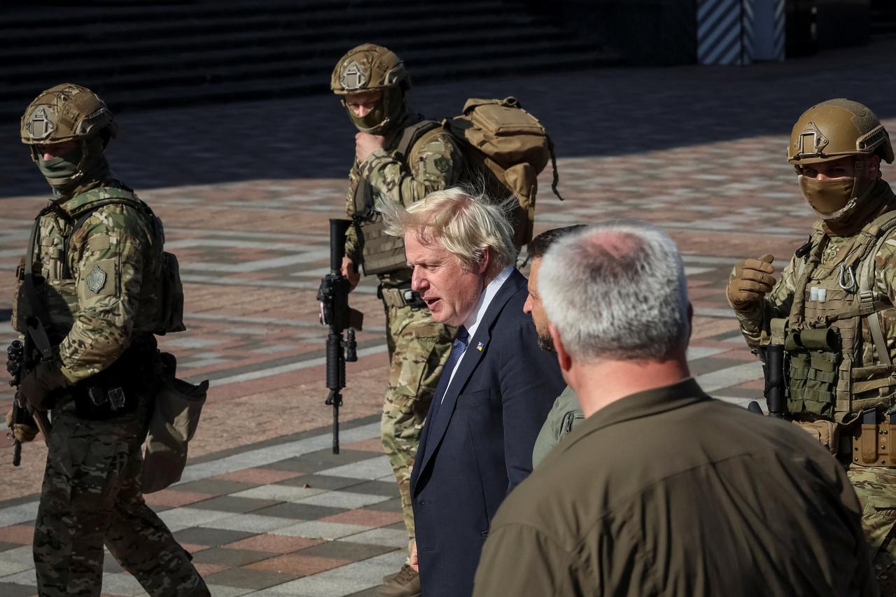 Ukraine's President Zelenskiy awards British Prime Minister Johnson walk in central Kyiv