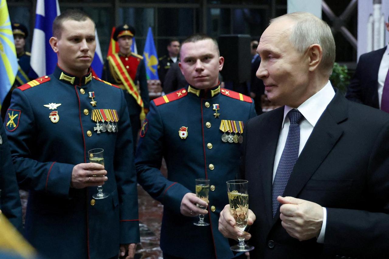 FILE PHOTO: Russian President Putin takes part in an awarding ceremony in Moscow