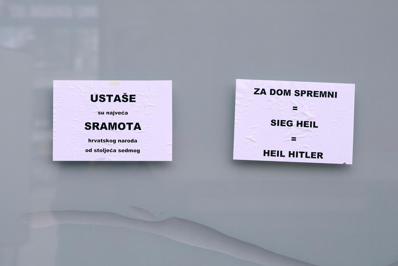"Ustaše su najveća sramota hrvatskog naroda od stoljeća sedmog", natpis je na papirima zalijepljenim na izlogu objekta koji se preuređuje. Osim toga, protuustavni ustaški pozdrav uspoređen je s nacističkim pozdravom koji se koristio u Njemačkoj tijekom 1930-ih i 1940-ih godina. 