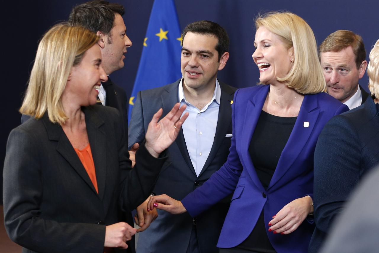 (L-R) European Union foreign policy chief Federica Mogherini, Italy's Prime Minister Matteo Renzi, Greek Prime Minister Alexis Tsipras, Danish Prime Minister Helle Thorning-Schmidt and Irish Prime Minister Enda Kenny pose for a family photo during an Euro