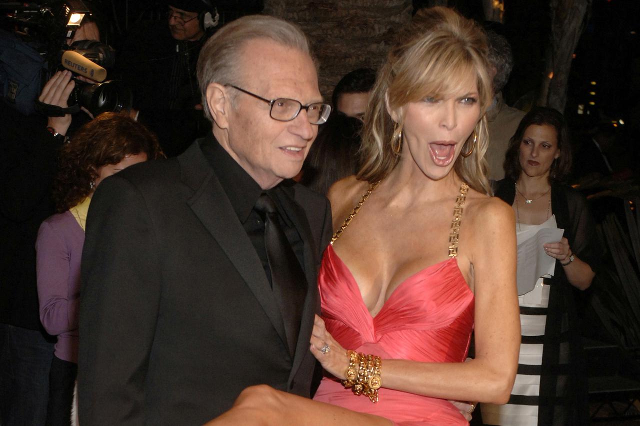 FILE PHOTO: Larry King and his wife Shawn arrive at the Vanity Fair Oscar Party at Mortons in West Hollywood, Ca..
