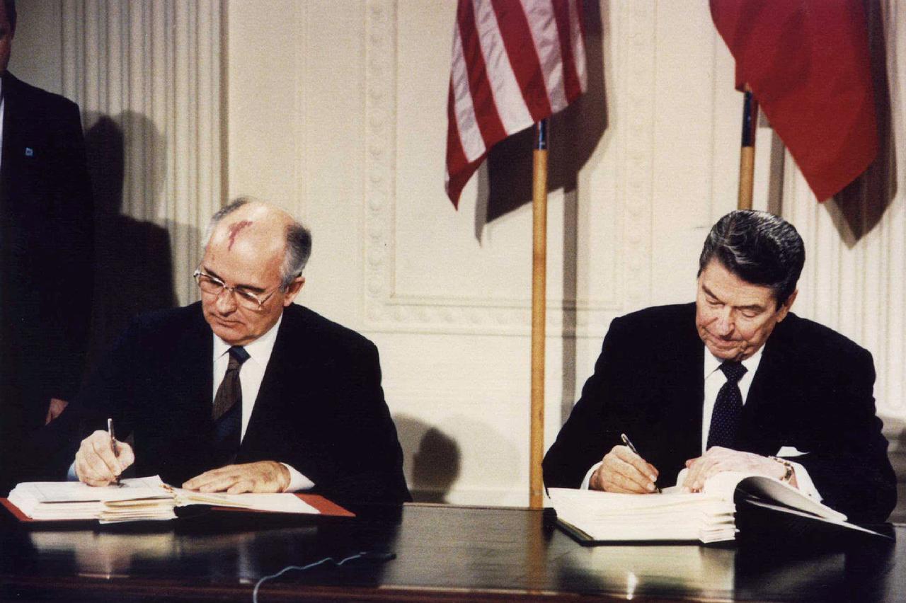 FILE PHOTO: Ronald Reagan and Mikhail Gorbachev sign the Intermediate-Range Nuclear Forces (INF) treaty in Washington