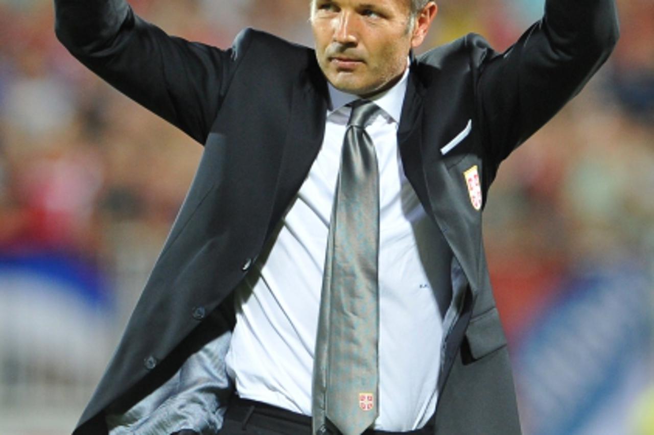 'Serbia\'s head coach Sinisa Mihajlovic waves to supporters after the FIFA 2014 World Cup qualifying football match between Serbia and Wales at the Karadjordje Stadium in Novi Sad on September 11, 201