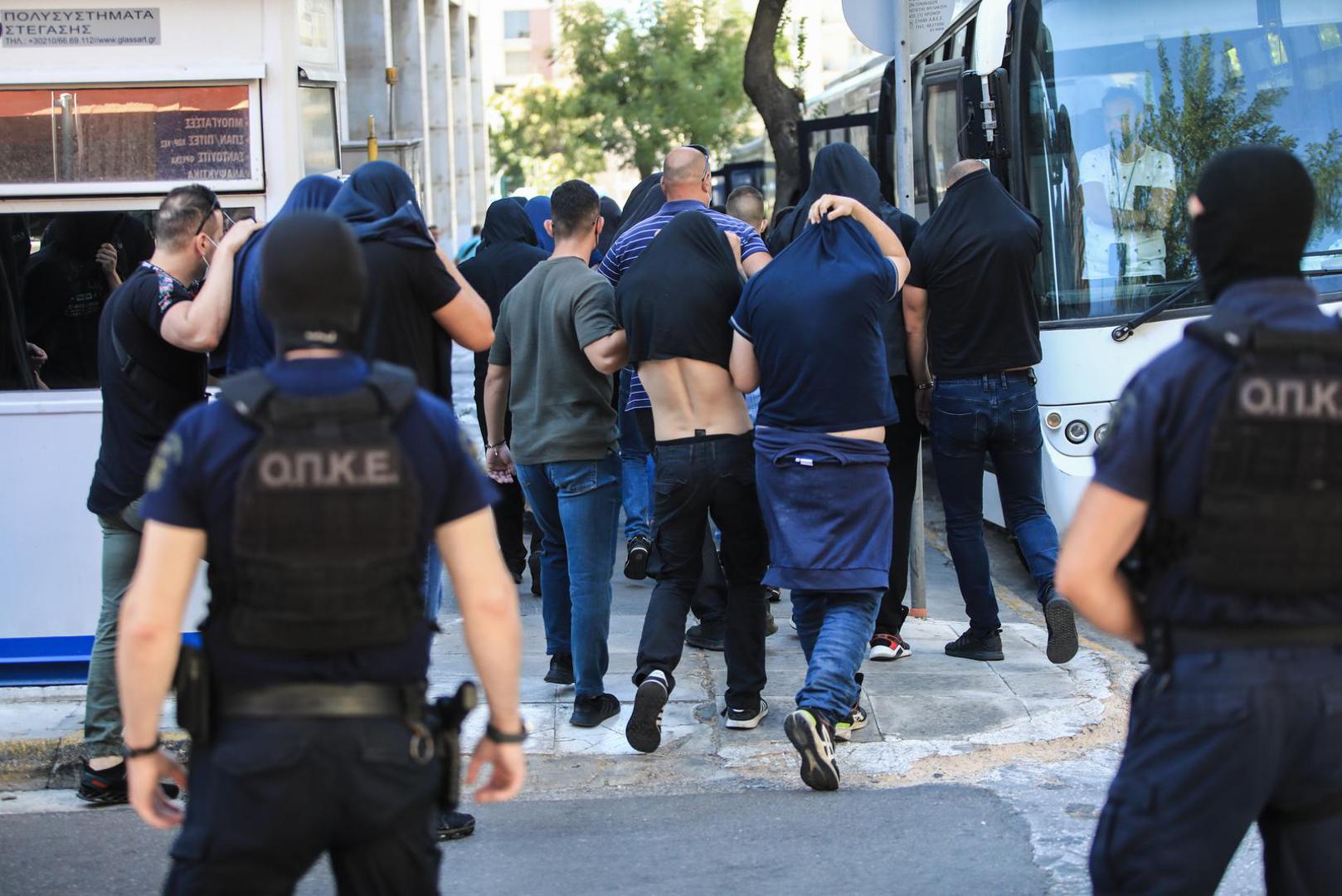 09.08.2023., Atena, Grcka - Svih 94 uhicenih osoba koje je grcka policija privela nakon navijackih nereda uoci utakmice 3. pretkola kvalifikacija Lige prvaka izmedju AEK-a i Dinama odvedeni su pred tuzitelja.  Photo: Yiannis Panagopoulos/EUROKINISSI/PIXSELL