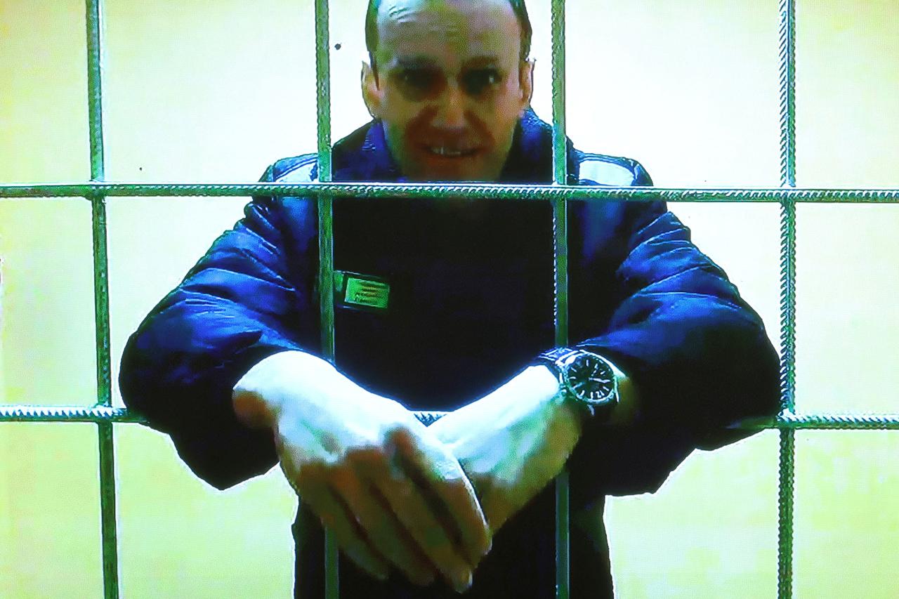FILE PHOTO: Jailed Russian opposition leader Alexei Navalny attends a court hearing via video link