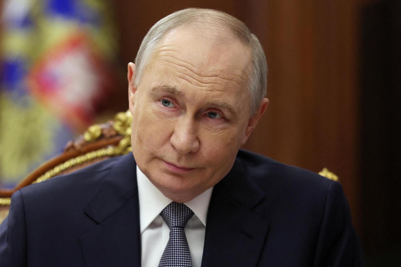 Russian President Vladimir Putin meets with Culture Minister Olga Lyubimova in Moscow
