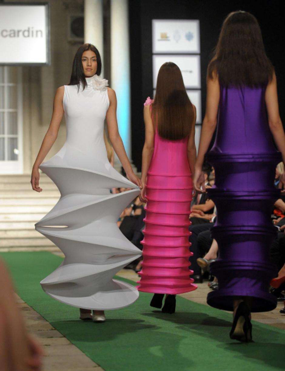 'Models present outfits of the haute couture collection designed by French Pierre Cardin late on June 9, 2012 during a fashion show at Serbia\'s royal palace in Belgrade.   AFP PHOTO / ALEXA STANKOVIC
