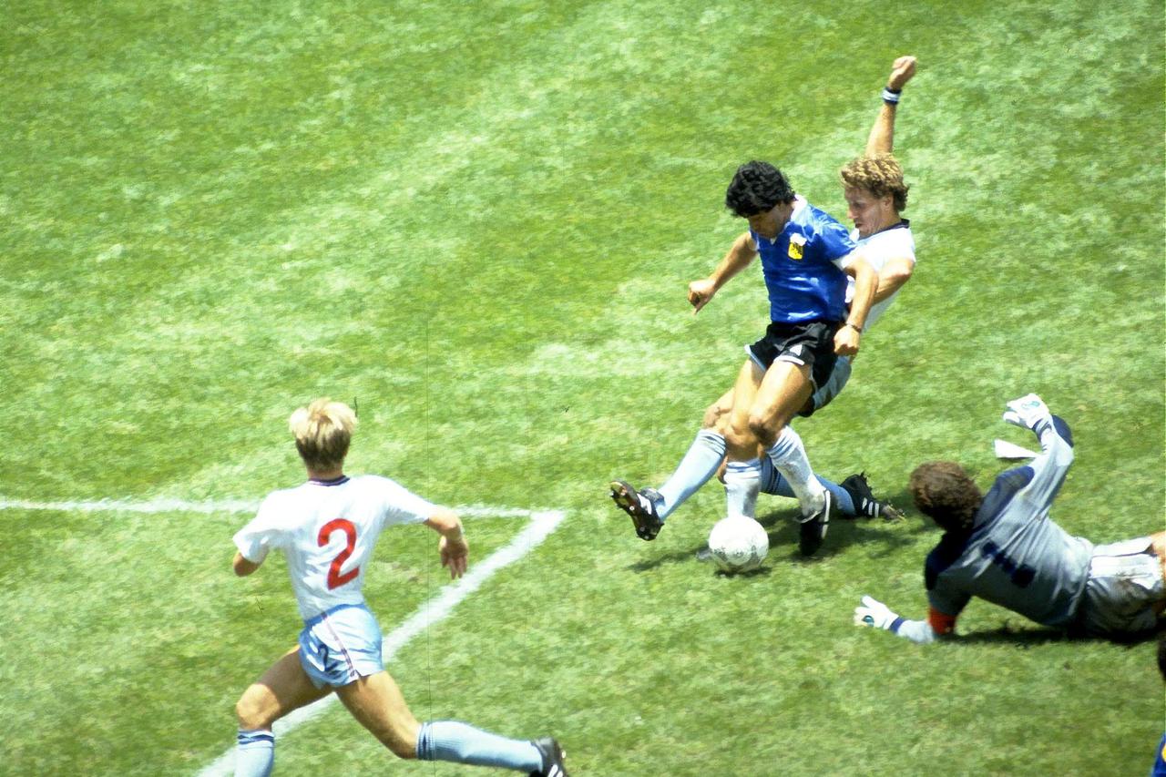 FILE PHOTO: Diego Maradona scores for Argentina