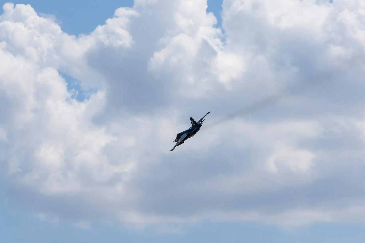 A Russian Sukhoi Su-25 plane with a Z sign flies near the settlement of Olenivka