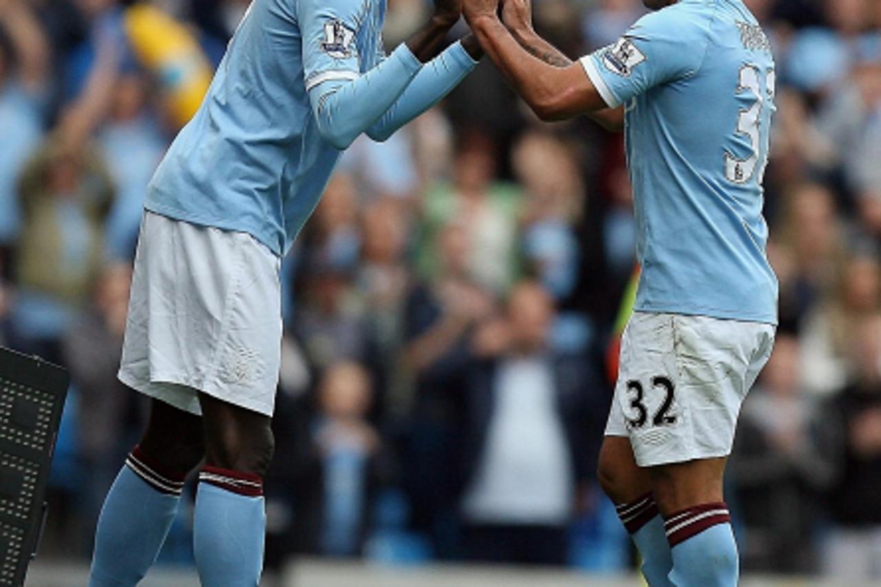 '25.09.2010, City of Manchester Stadium, Manchester, ENG, PL, Manchester City vs Chelsea FC, im Bild Manchester City\'s Carlos Tevez is substitures , here with Manchester City\'s Emmanuel Adebayor,  F