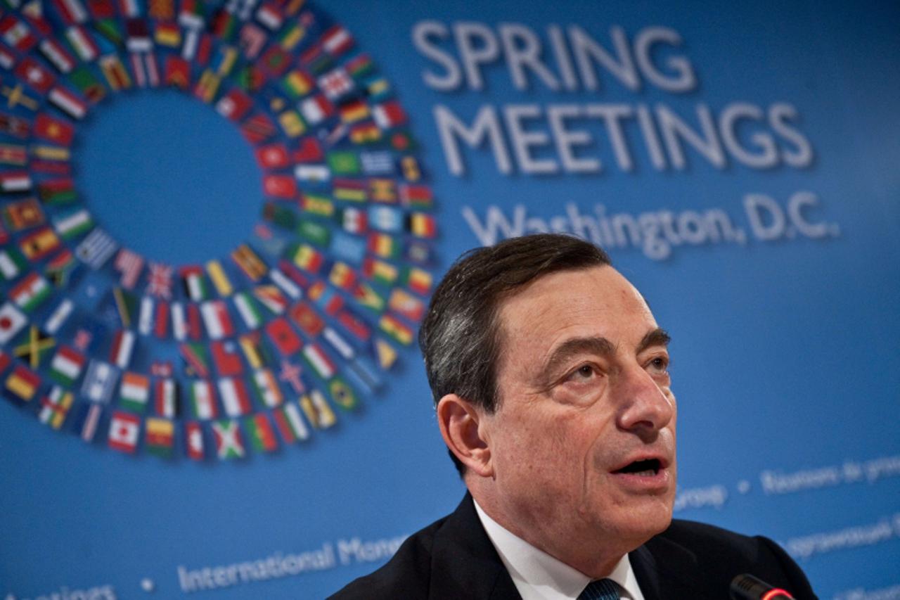 'Italian central bank governor Mario Draghi speaks at a press conference at the IMF/World Bank Spring meetings in Washington on April 16, 2011.      AFP PHOTO/Nicholas KAMM'