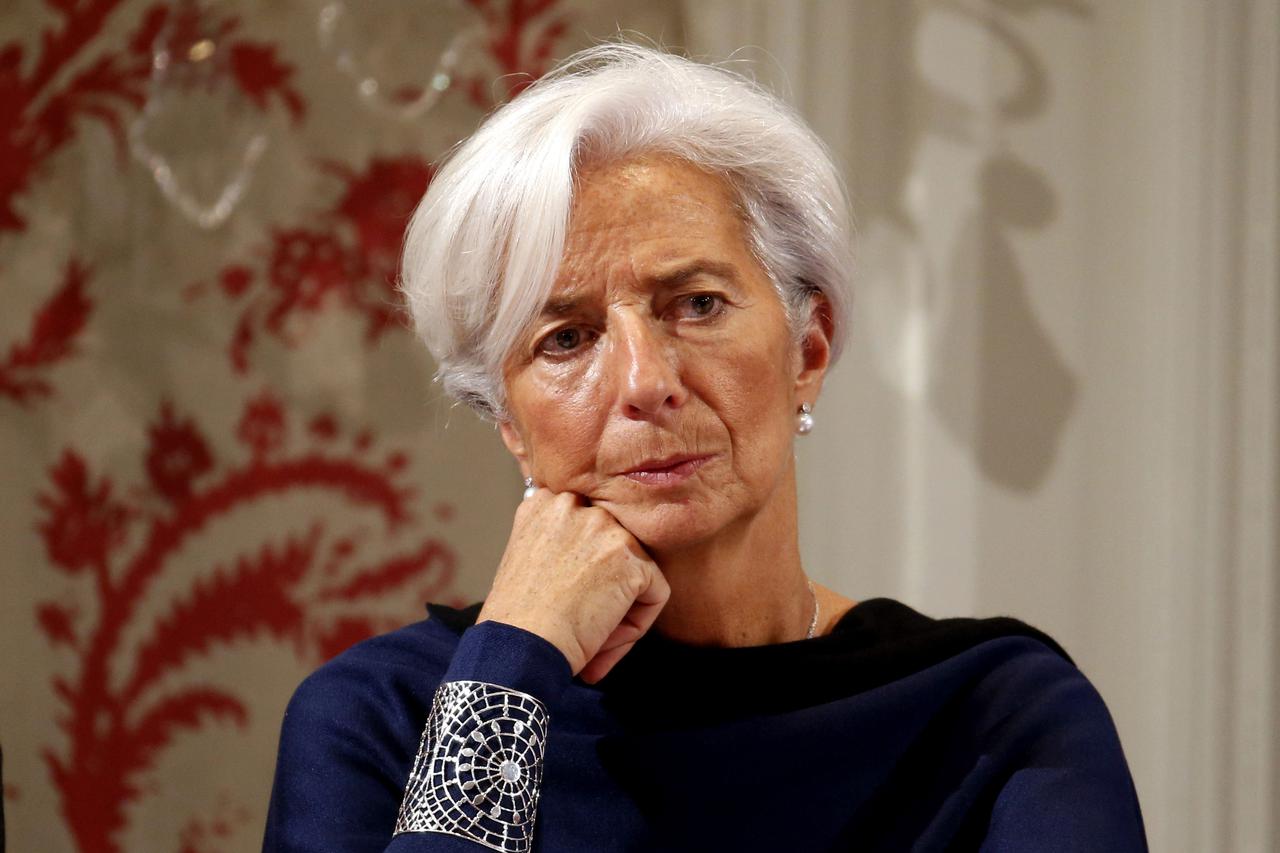 International Monetary Fund (IMF) President Christine Lagarde attends a conference of central bankers hosted by the Bank of France in Paris, in this November 7, 2014 file photo. The euro edged away from an 11-year low on January 19, 2015 as investors brac