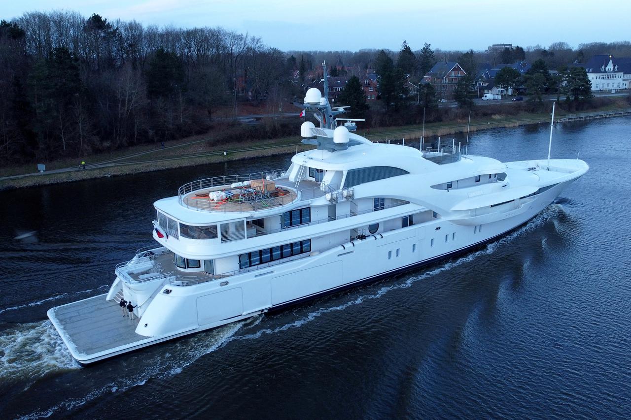 The yacht "Graceful" sails along the Kiel Canal (Nord Ostsee Kanal) near Rendsburg