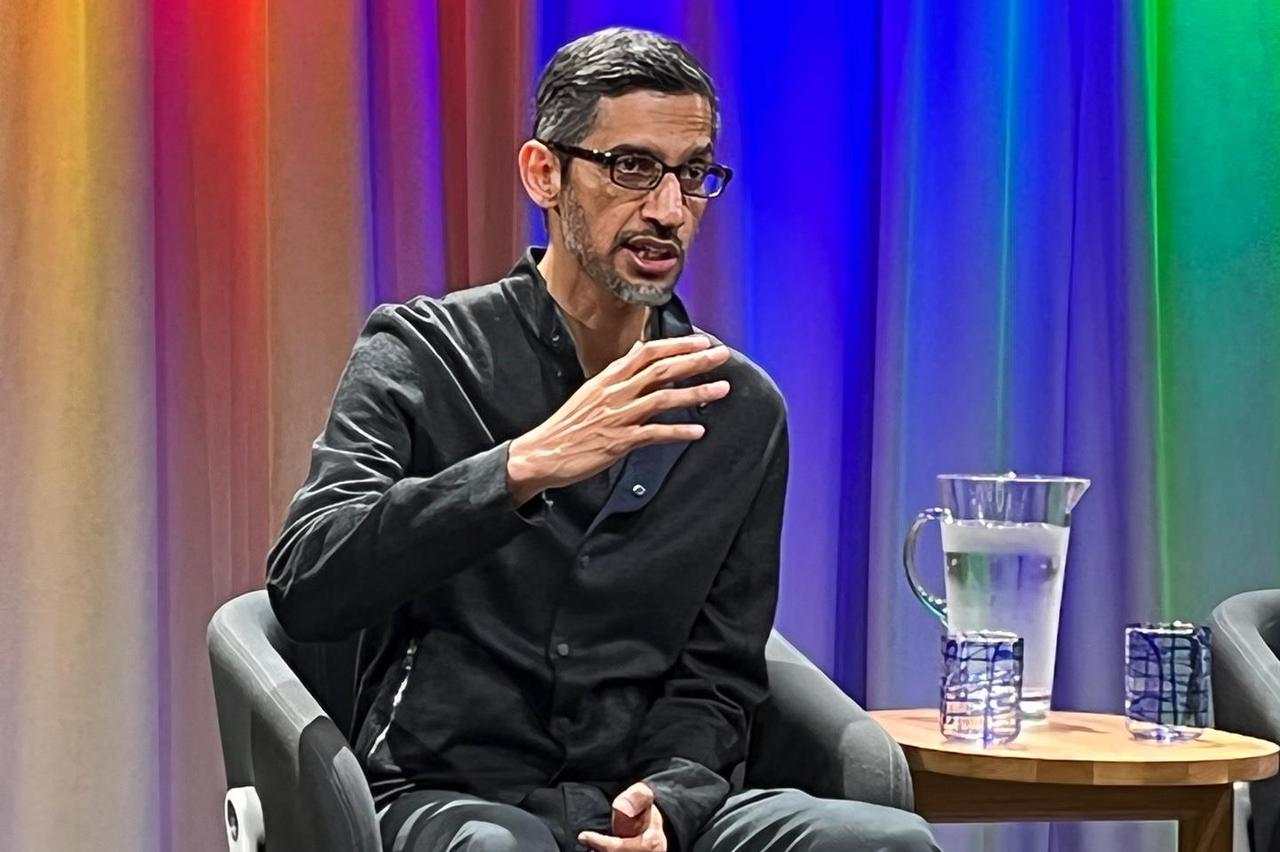 Google chief attends press conference