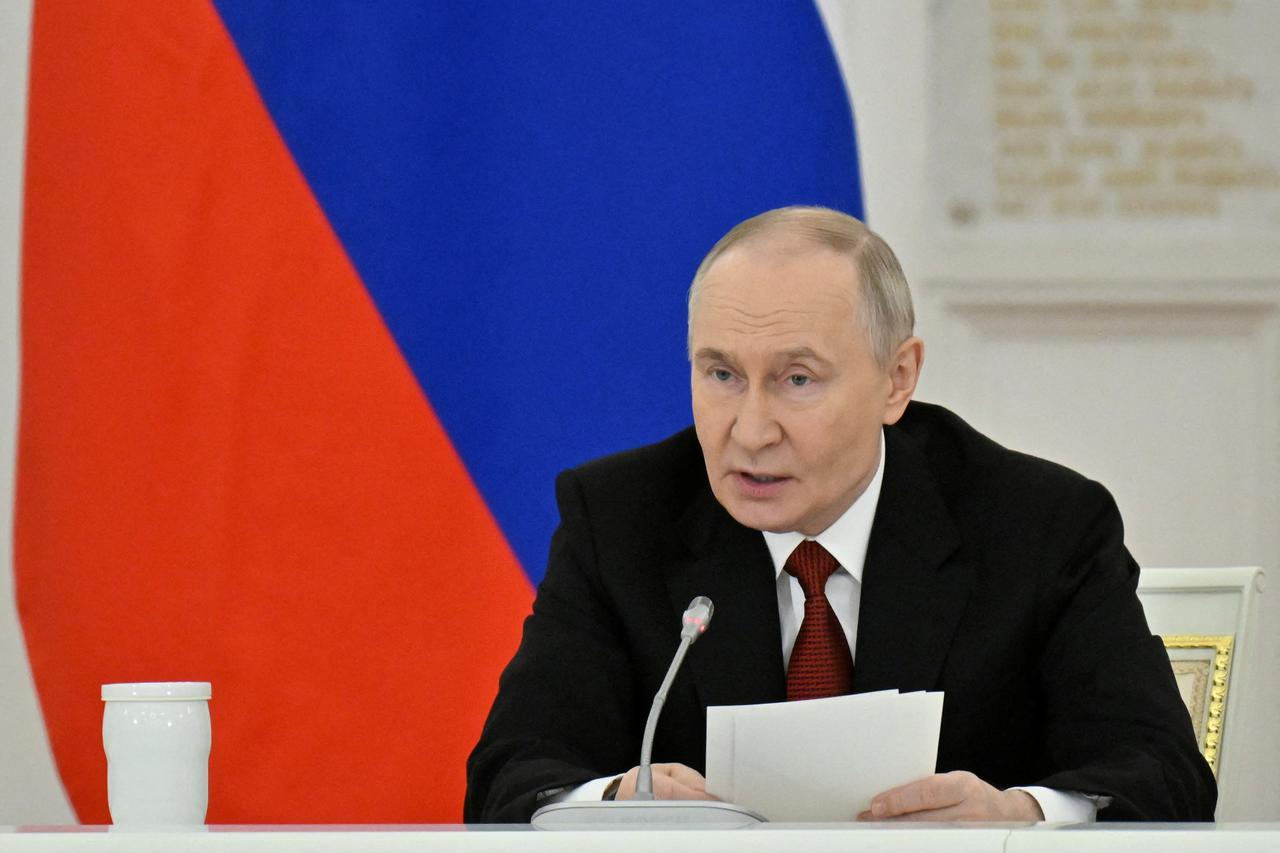 Russian President Vladimir Putin chairs a State Council meeting at the Kremlin in Moscow