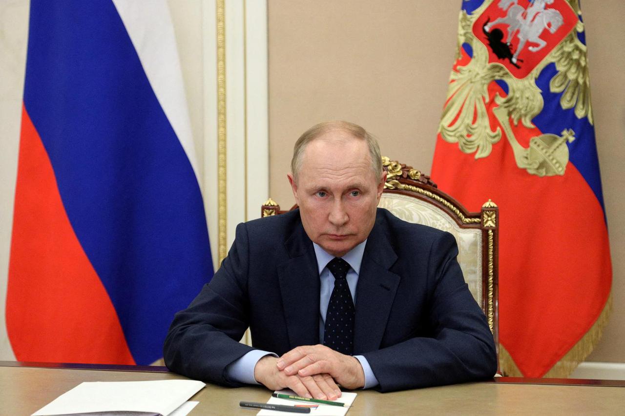 FILE PHOTO: Russian President Vladimir Putin attends a meeting with acting Governor of Kirov region Alexander Sokolov via a video link in Moscow