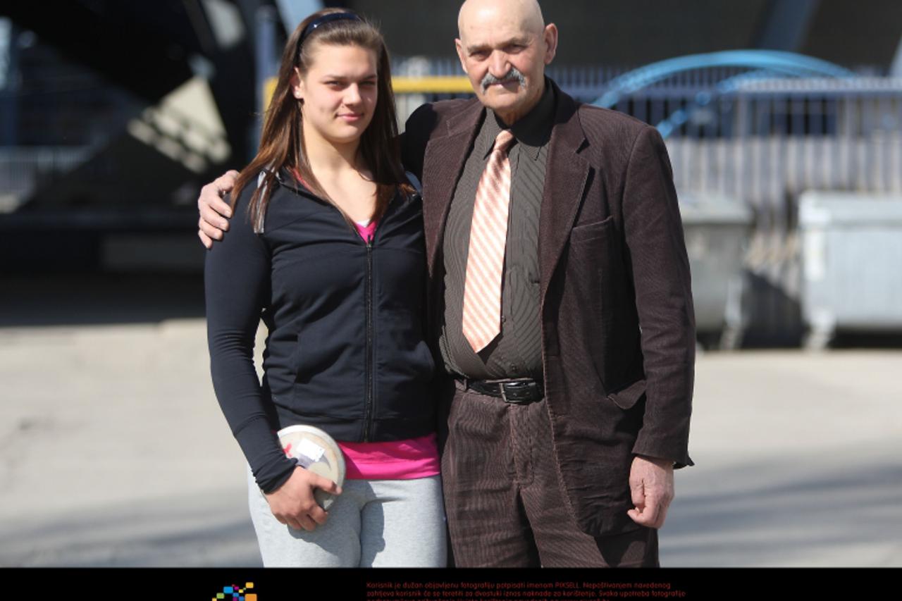 '17.03.2010.,Zagreb,Hrvatska - Sandra Perkovic,hrvatska atleticarka,prvakinja u bacanju diska i clanica Atletskog kluba Dinamo-Zrinjevac.Sandra Perkovic sa trenerom Ivanom Ivancicem. Photo: Davor Pukl