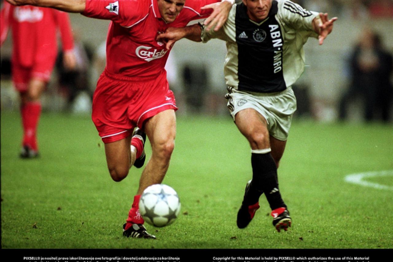 'Ajax\'s Maxwell and Liverpool\'s Igor Biscan battle for the ballPhoto: Press Association/PIXSELL'
