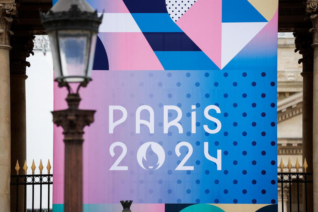 The logo of the Paris 2024 Olympic and Paralympic Games is pictured in front of the National Assembly in Paris