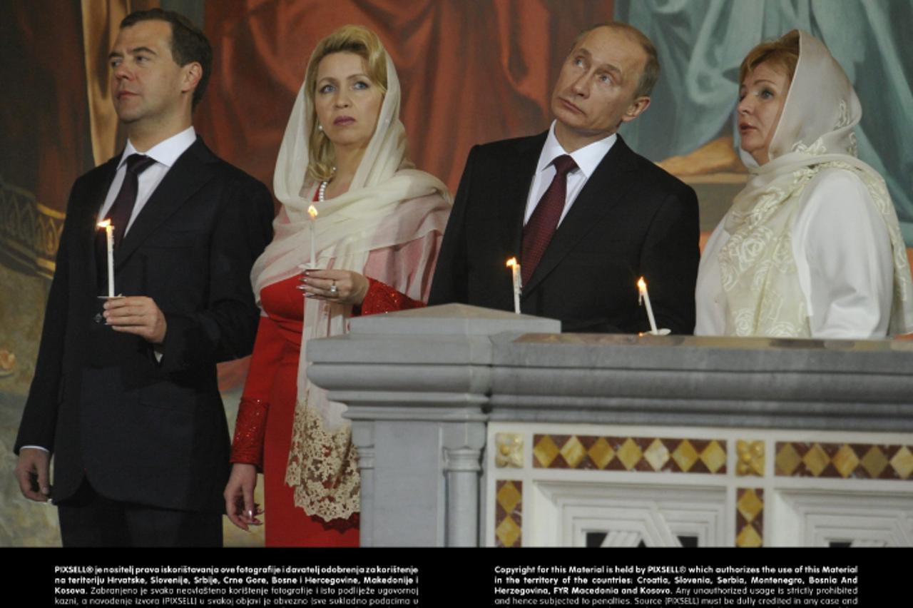 'WORLD RIGHTS NO USA, FRANCE, AUSTRALIA.   Russian Orthodox Patriarch Kirill conducts night Easter service in the Christ the Savior Cathedral in Moscow, Russia. 24/04/2011  Pictured: (L-R) Russian Pre