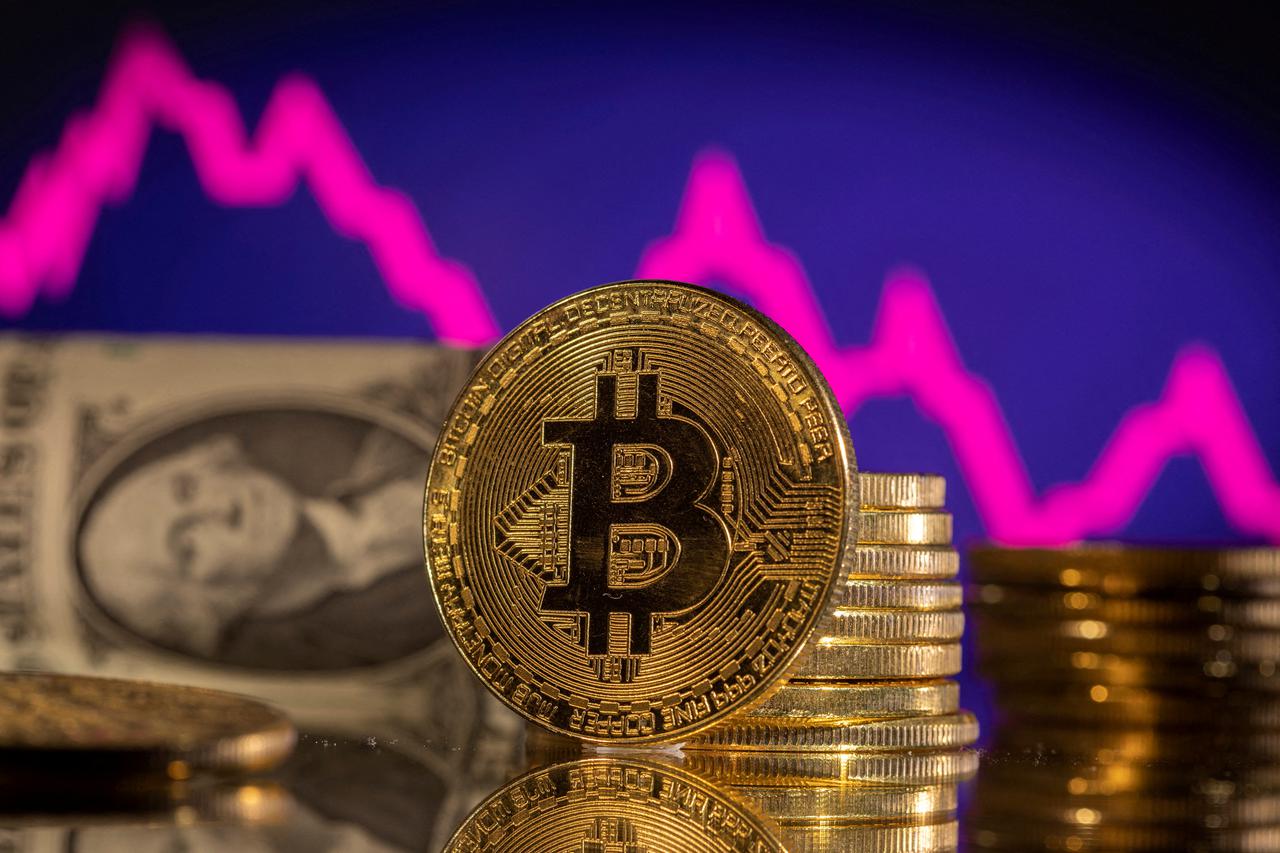 FILE PHOTO: Illustration shows representations of cryptocurrency Bitcoin