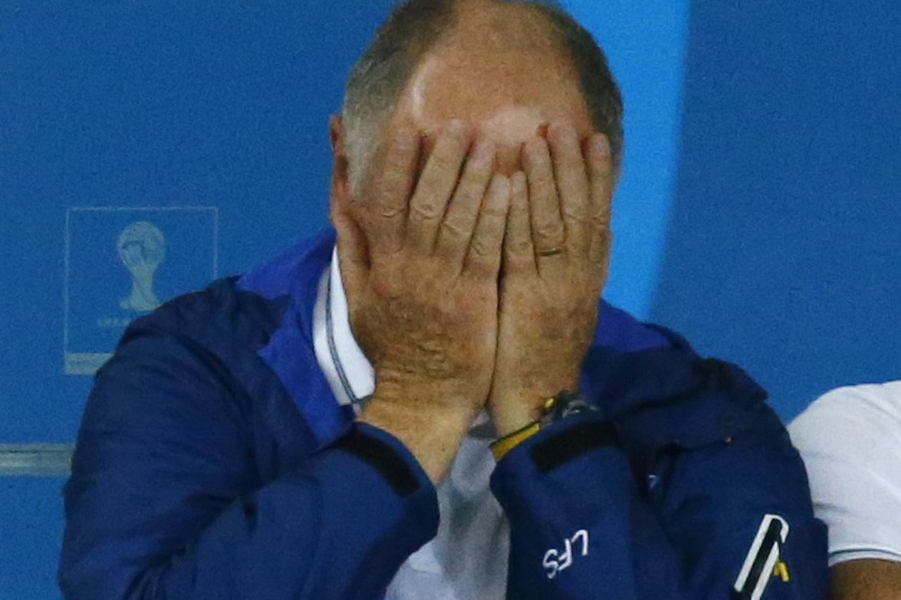 Brazil's coach Luiz Felipe Scolari reacts during his team's 2014 World Cup semi-finals against Germany at the Mineirao stadium in Belo Horizonte July 8, 2014. REUTERS/Ruben Sprich (BRAZIL  - Tags: SOCCER SPORT WORLD CUP TPX IMAGES OF THE DAY)