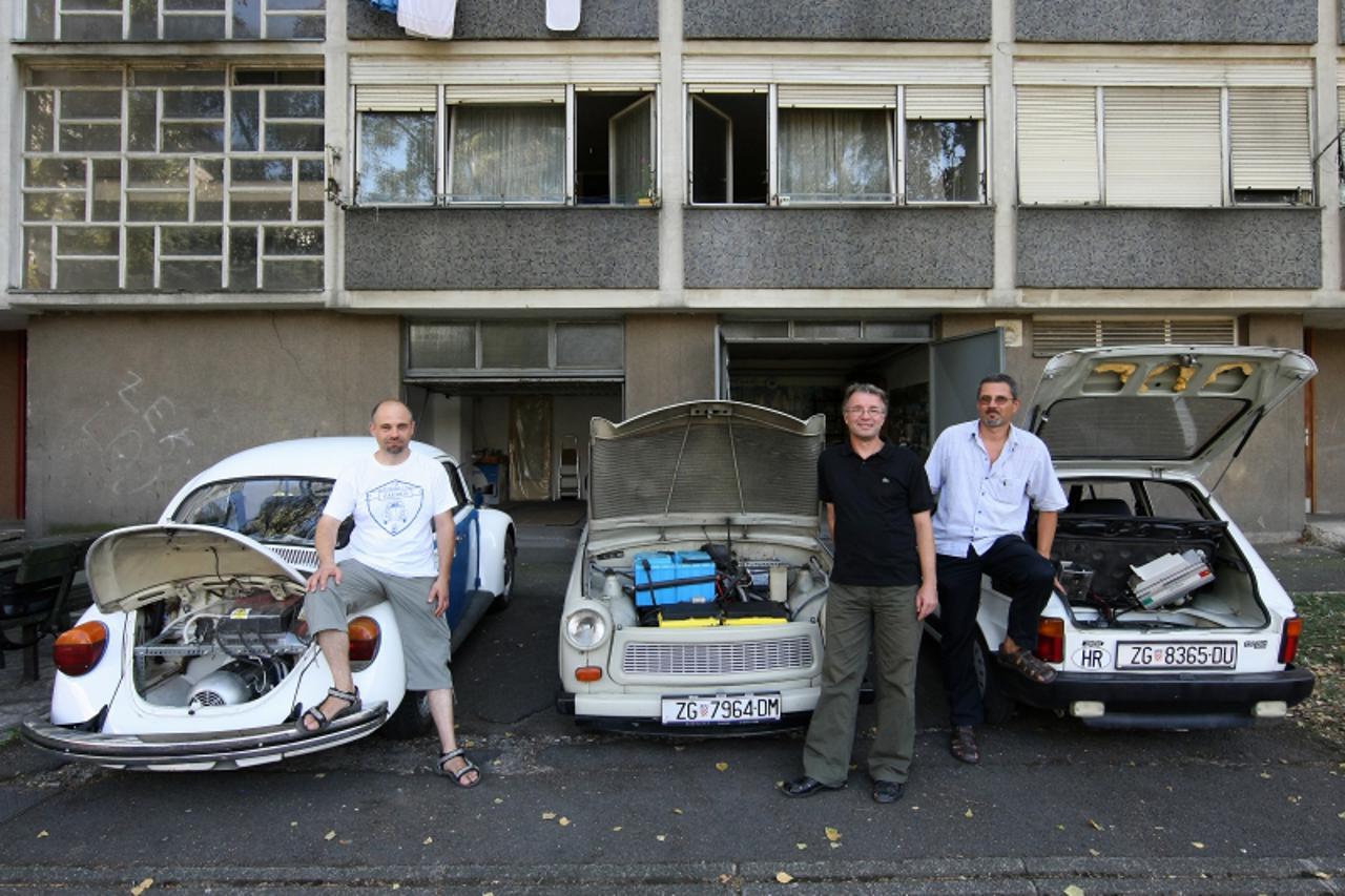 '24.08.2011., Zagreb -  Automobili na elektricni pogon iz kucne radinosti. Vlasnici elektricnih automobila Domagoj Lisicak,Roman Sajko i Tomislav Cubelic. Photo: Jurica Galoic/PIXSELL'