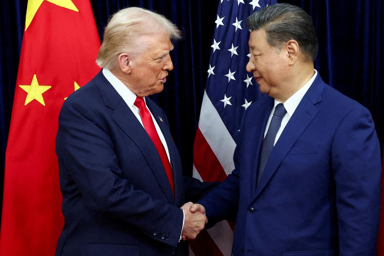 FILE PHOTO: FILE PHOTO: U.S. President Donald Trump meets with Chinese President Xi Jinping on the sidelines of the APEC summit, in Busan