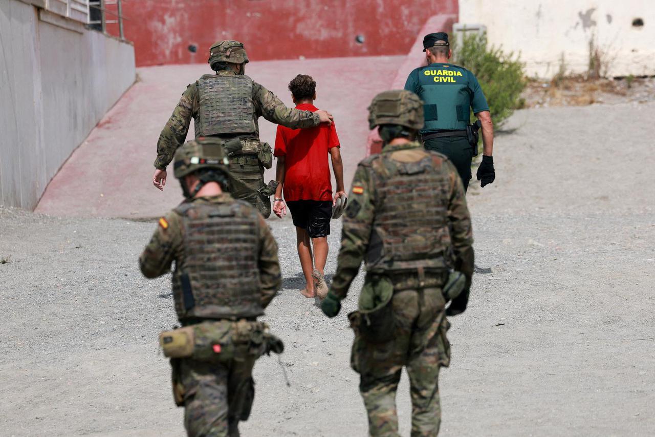 Mass crossings of migrants on foot and by sea from Morocco into Spanish territory, in Ceuta