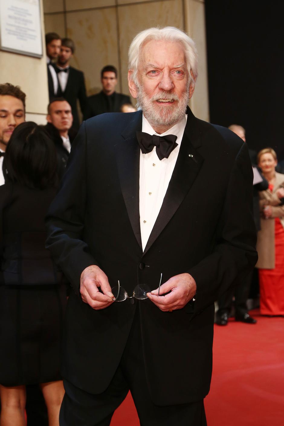Donald Sutherland poses on the red carpet during the