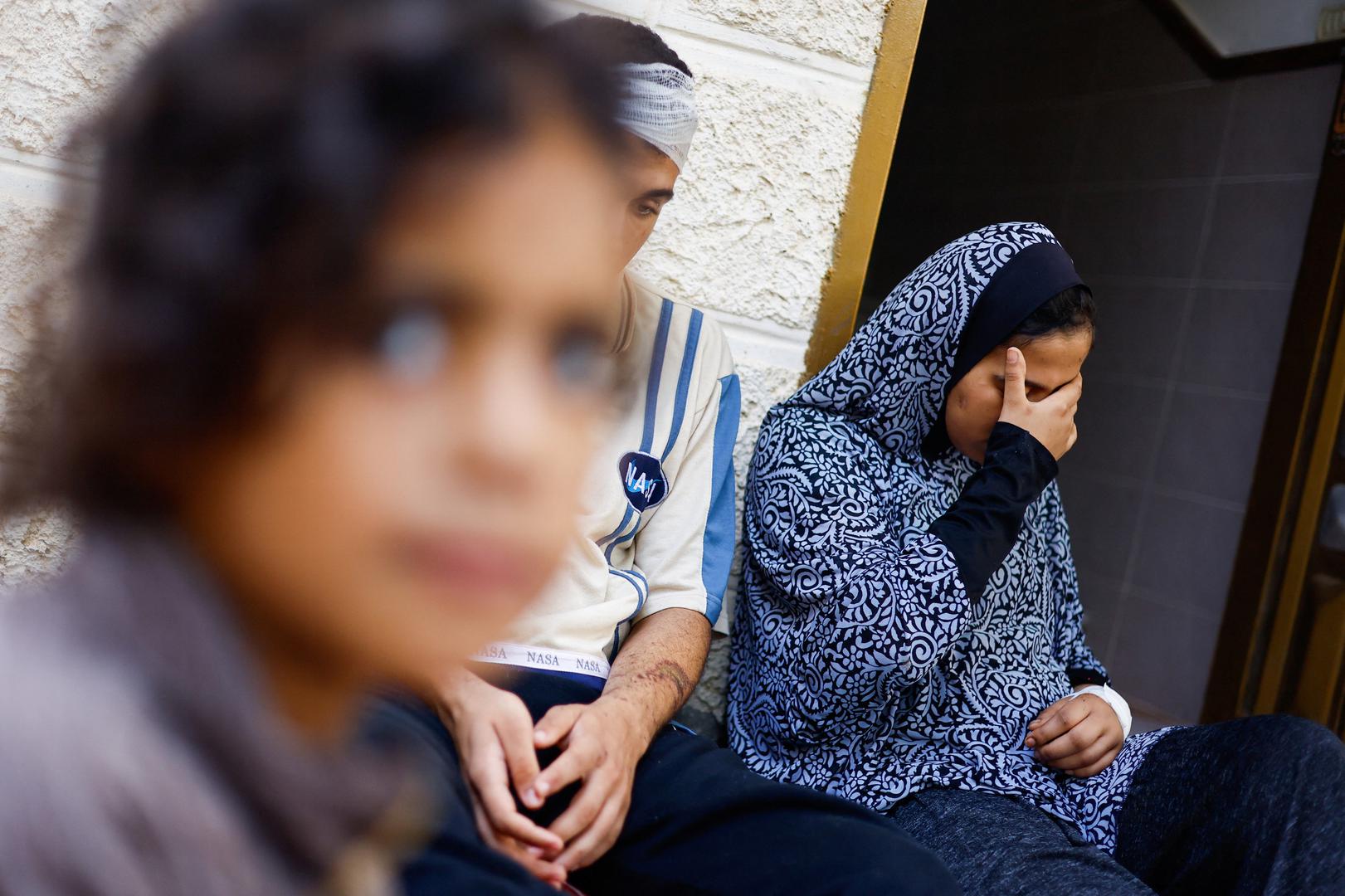 Palestinian teenager Dima Allamdani, who fled to southern Gaza Strip with her family to avoid the constant onslaught of Israeli airstrikes in Gaza City and settled in a shelter that was later hit by Israeli jets which killed 13 of her relatives, including her parents, 7 siblings and 4 members of her uncle's family, reacts in Khan Younis in the southern Gaza Strip, October 22, 2023. REUTERS/Mohammed Salem Photo: MOHAMMED SALEM/REUTERS