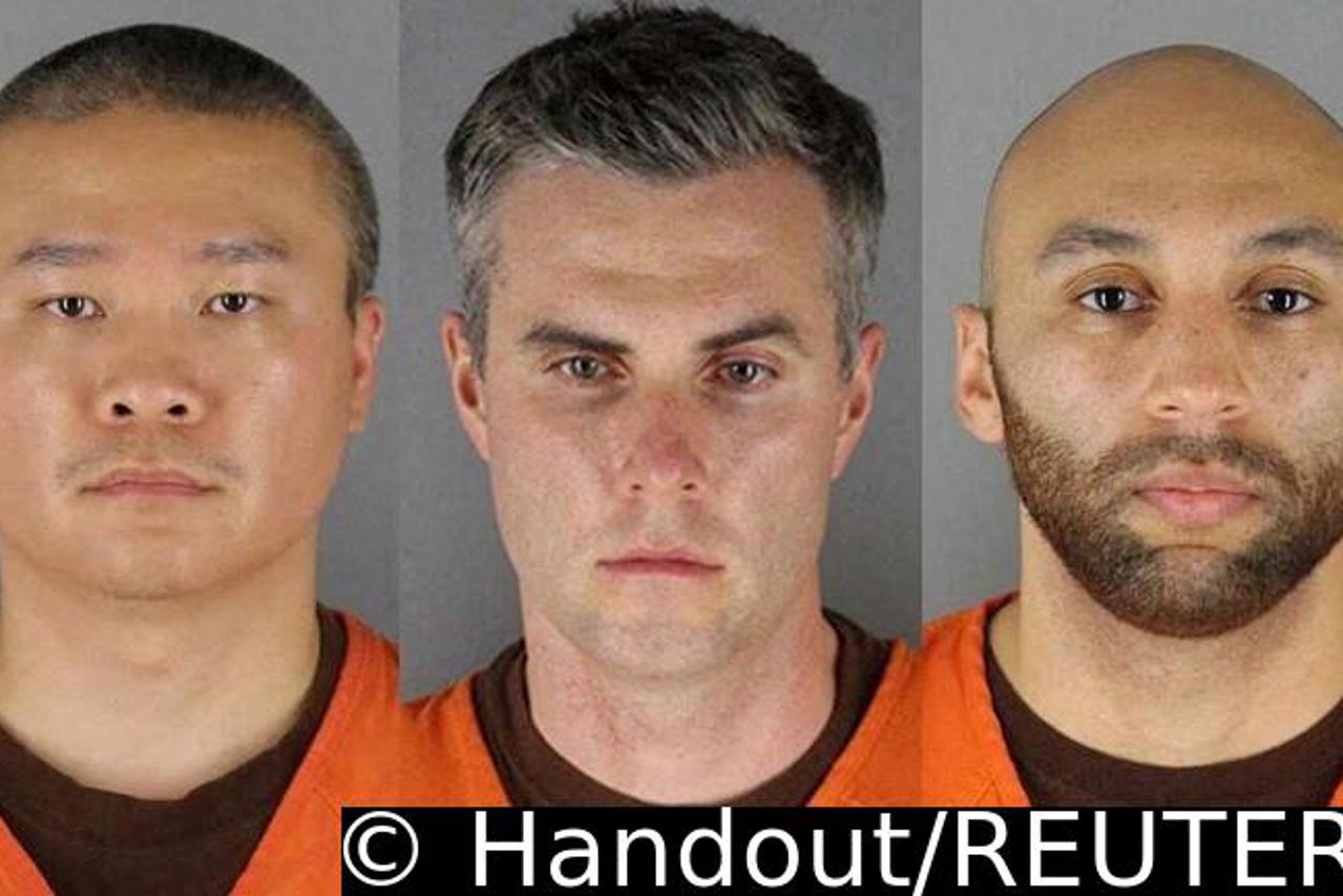 FILE PHOTO: Former Minneapolis police officers pose for booking photographs in Minneapolis