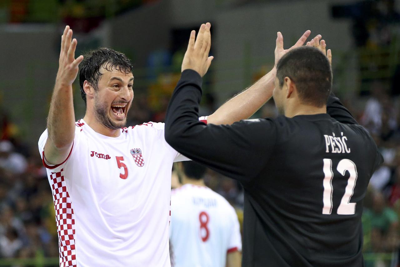 2016 Rio Olympics - Handball - Preliminary - Men's Preliminary Group A Denmark v Croatia - Future Arena - Rio de Janeiro, Brazil - 11/08/2016. Domagoj Duvnjak (CRO) of Croatia and Ivan Pesic (CRO) of Croatia react. REUTERS/Shannon Stapleton FOR EDITORIAL 