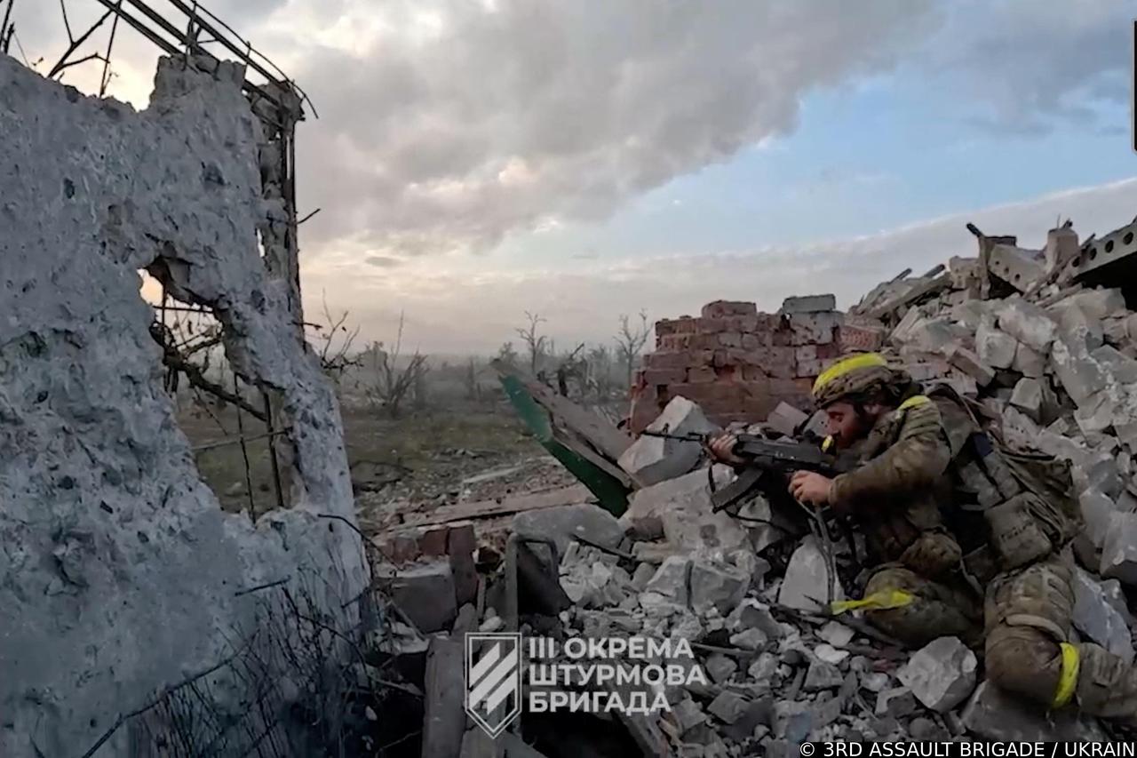 A view of a Ukrainian soldier purportedly liberating Andriivka