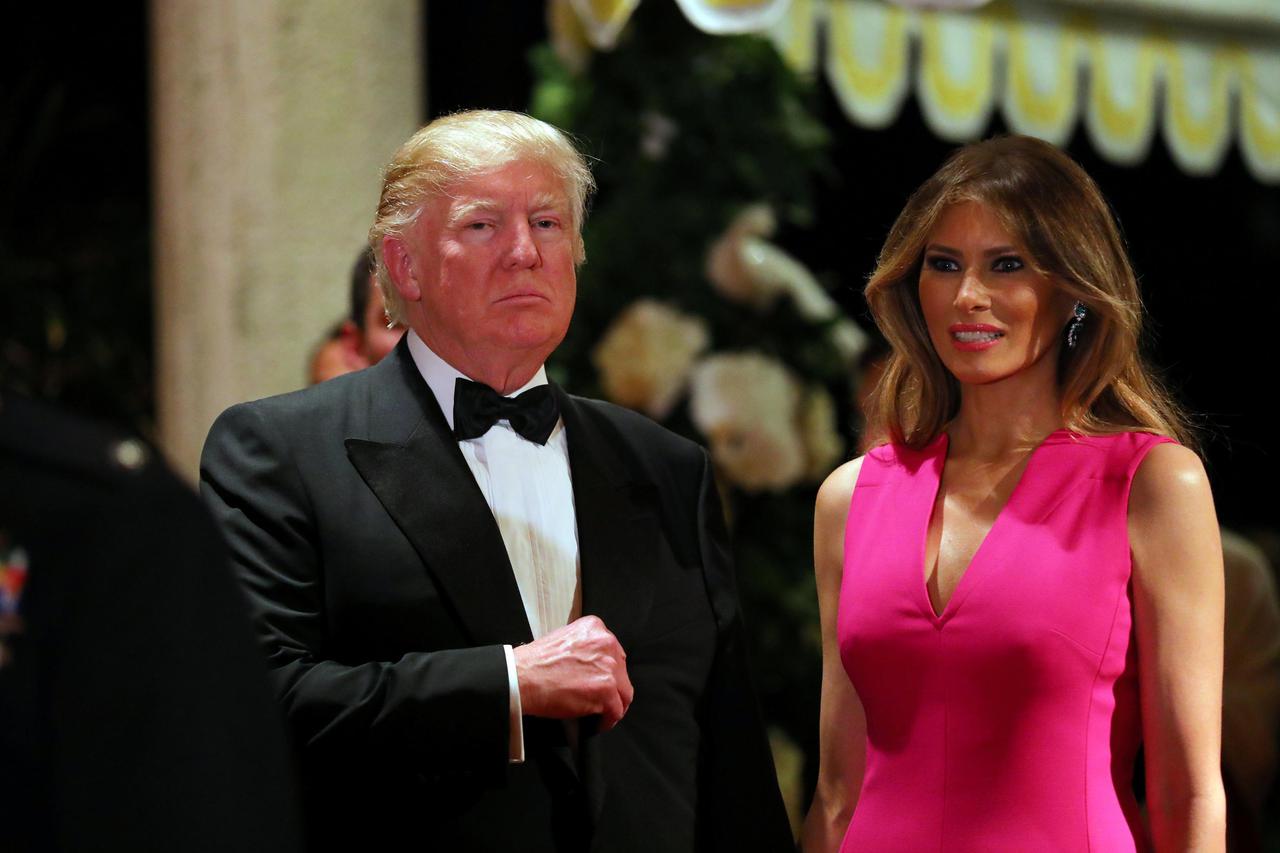 U.S. President Donald Trump and First Lady Melania Trump attend the 60th Annual Red Cross Gala at Mar-a-Lago club in Palm Beach, Florida, U.S U.S. President Donald Trump and First Lady Melania Trump attend the 60th Annual Red Cross Gala at Mar-a-Lago club