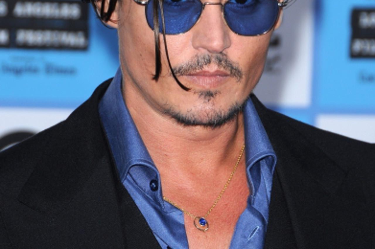 'Johnny Depp at the premiere of \'Public Enemies\' at the Mann Village Theatre in Hollywood, California. Photo: Press Association/Pixsell'