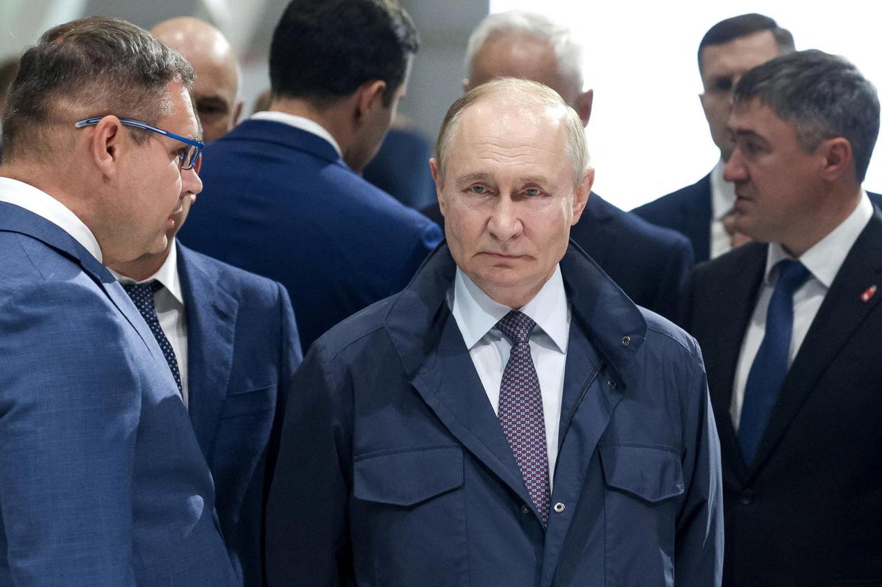 Russian President Vladimir Putin tours the exhibition of weapons and military equipment as he visits Motovilikha Plants in Perm