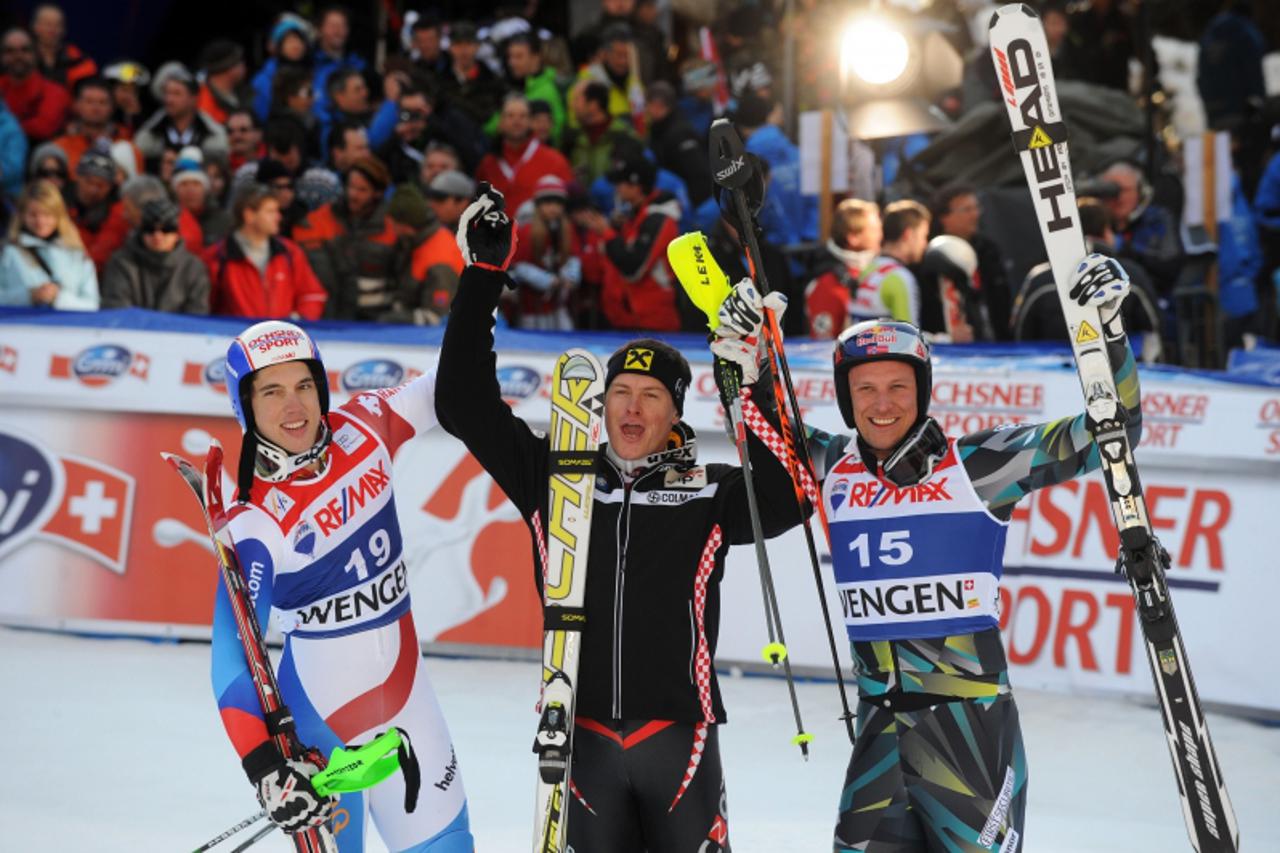 \'(L to R) Switzerland\'s Carlo Janka, second, winner Croatia\'s Ivica Kostelic and Norway\'s Aksel Lund Svindal, third, pose prior to the podium ceremony of the FIS World Cup Men\'s Super combined in