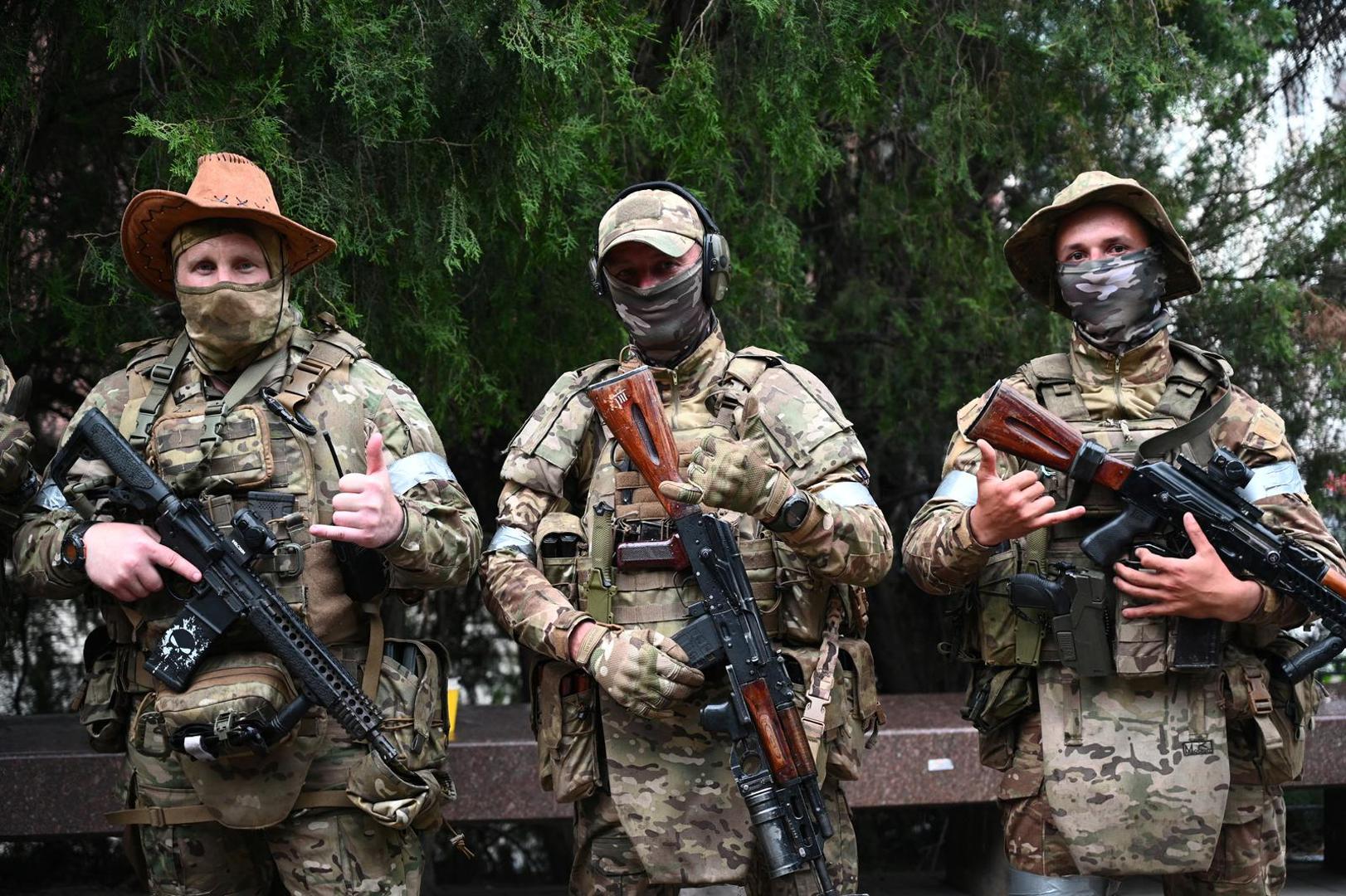 Fighters of Wagner private mercenary group pose for a picture as they get deployed near the headquarters of the Southern Military District in the city of Rostov-on-Don, Russia, June 24, 2023. REUTERS/Stringer Photo: Stringer/REUTERS