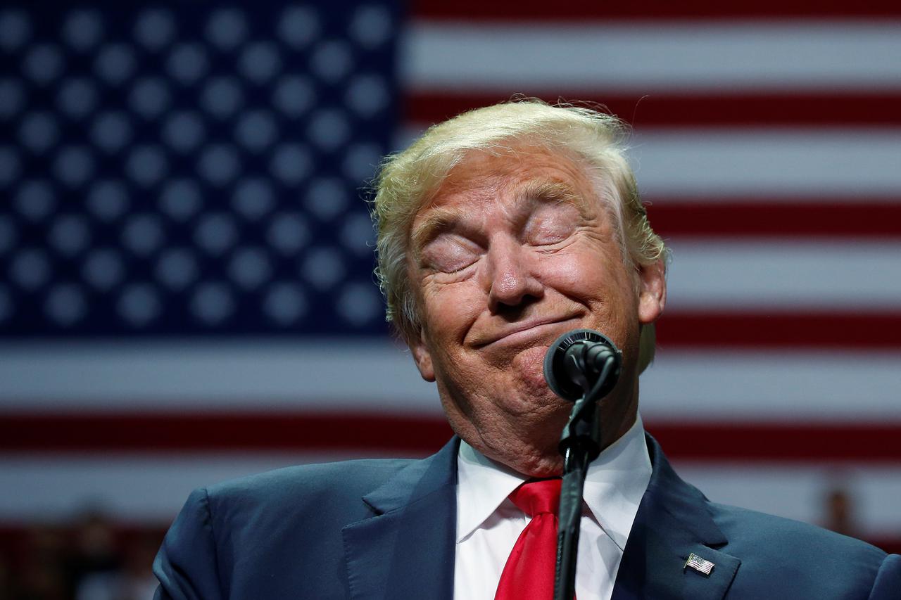 Republican presidential nominee Donald Trump attends a campaign event in Hershey Republican presidential nominee Donald Trump attends a campaign event in Hershey, Pennsylvania, U.S. November 4, 2016.   REUTERS/Carlo Allegri     TPX IMAGES OF THE DAY      
