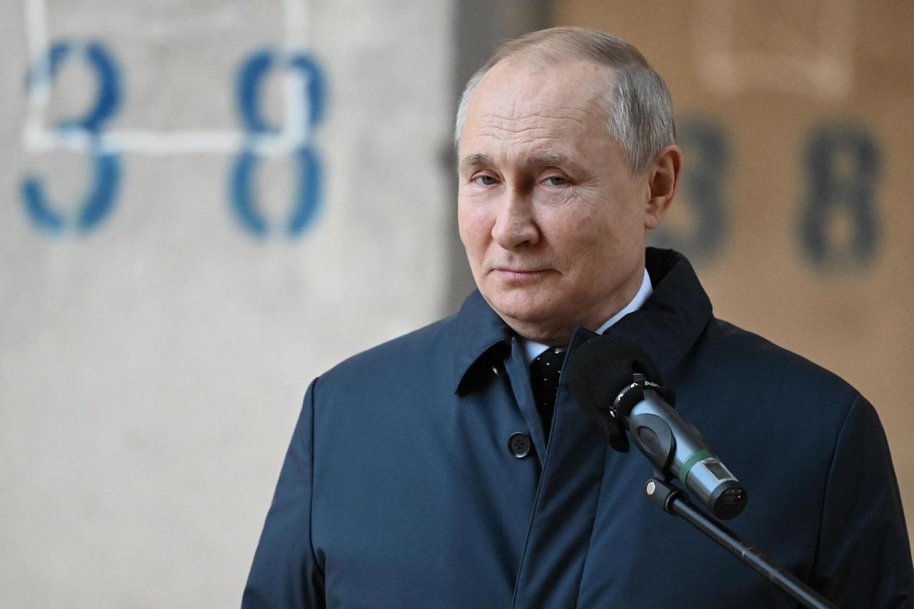 Russian President Vladimir Putin visits the construction site of the National Space Agency in Moscow