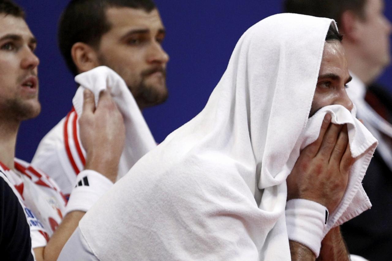 \'Croatia\'s Ivano Balic reacts during their men\'s European Handball Championship semifinals match against Serbia in Belgrade January 27, 2012.   REUTERS/Ivan Milutinovic (SERBIA  - Tags: SPORT HANDB
